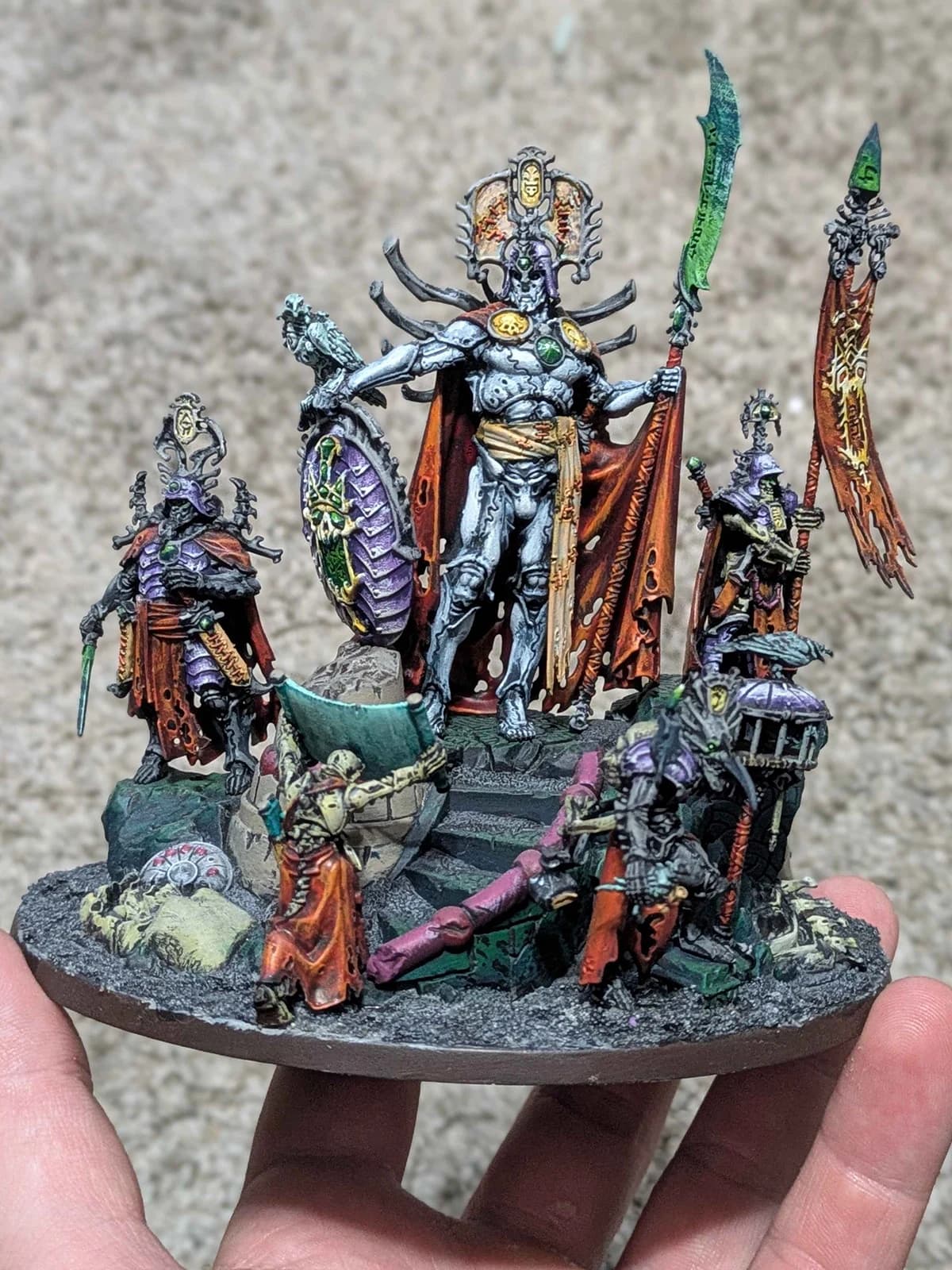 Hand-painted skeletal king and attendants with purple armor and red banners